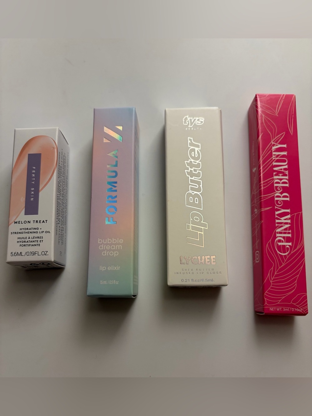 Ty Lip Butter Lychee Shimmer Gloss - Iridescent Pink/White Box